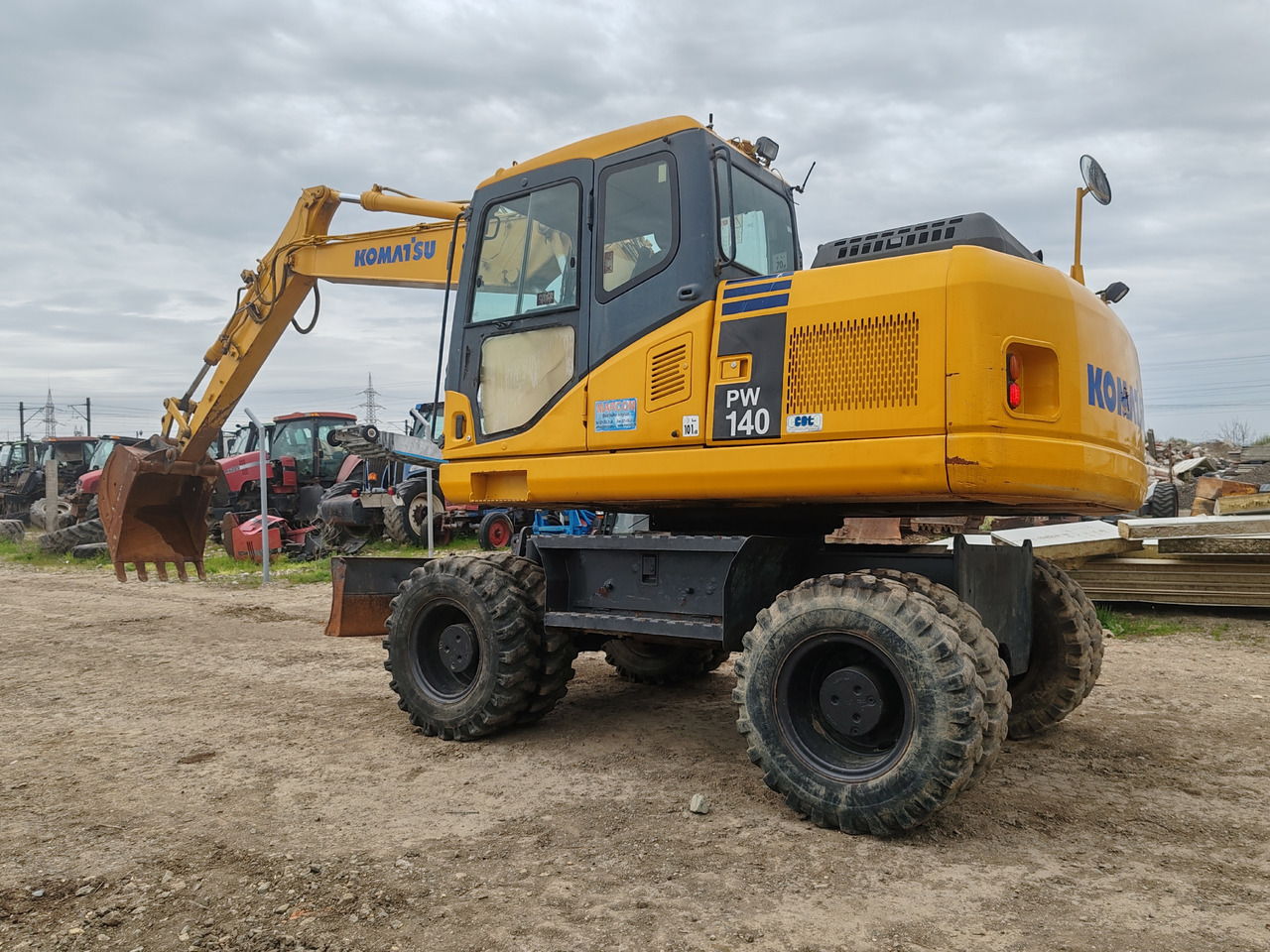 Komatsu PW140-7 - Ratinis ekskavatorius: foto 5 Komatsu PW140-7 - Ratinis ekskavatorius: foto 5