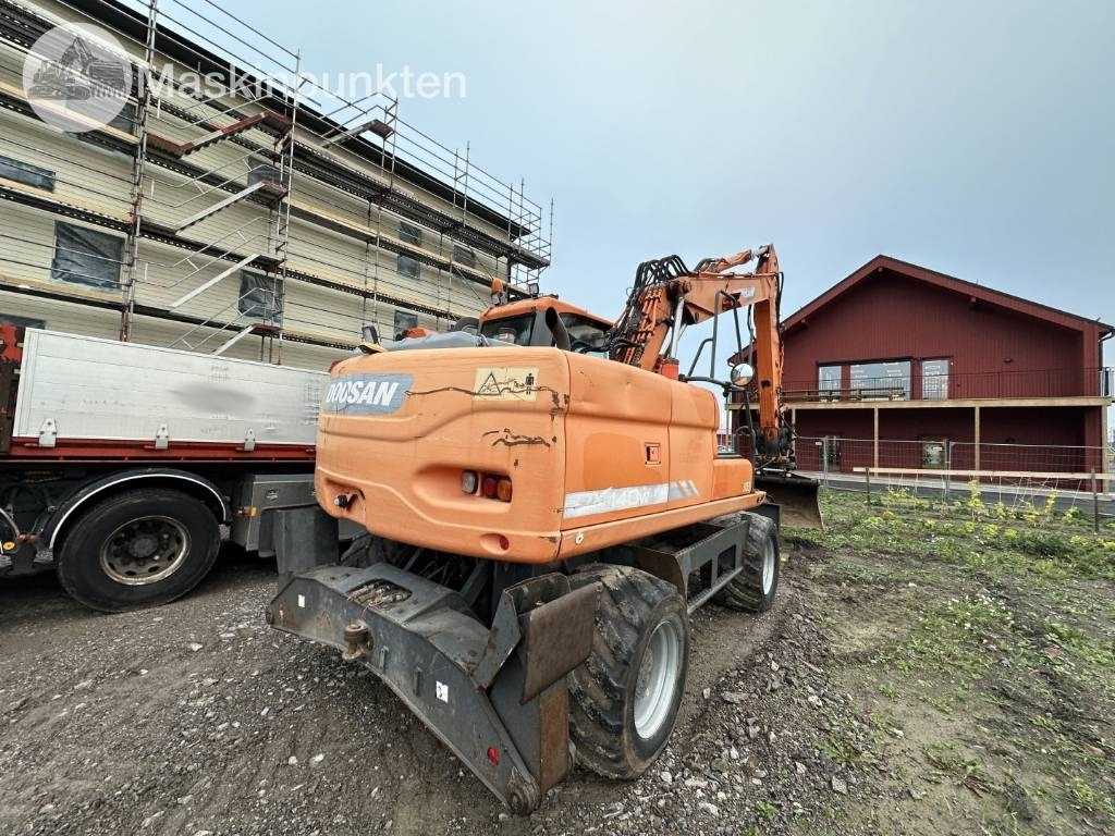 Doosan DX 140 W med vagn och redskap - Ratinis ekskavatorius: foto 4 Doosan DX 140 W med vagn och redskap - Ratinis ekskavatorius: foto 4