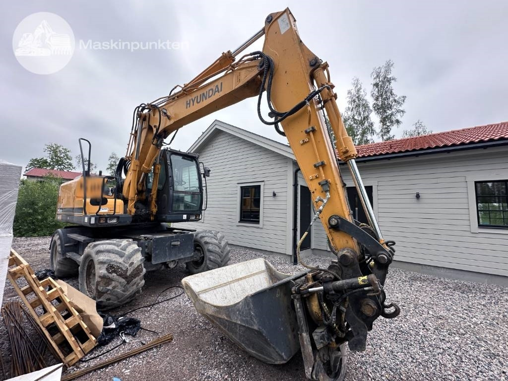 Hyundai Robex 140 W-7 A - Ratinis ekskavatorius: foto 3 Hyundai Robex 140 W-7 A - Ratinis ekskavatorius: foto 3