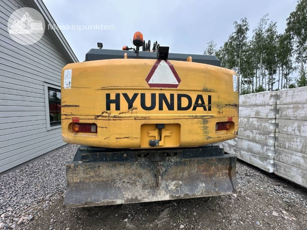 Hyundai Robex 140 W-7 A - Ratinis ekskavatorius: foto 5 Hyundai Robex 140 W-7 A - Ratinis ekskavatorius: foto 5