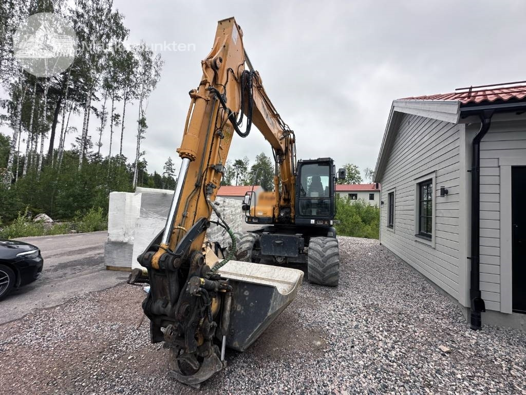 Hyundai Robex 140 W-7 A - Ratinis ekskavatorius: foto 2 Hyundai Robex 140 W-7 A - Ratinis ekskavatorius: foto 2