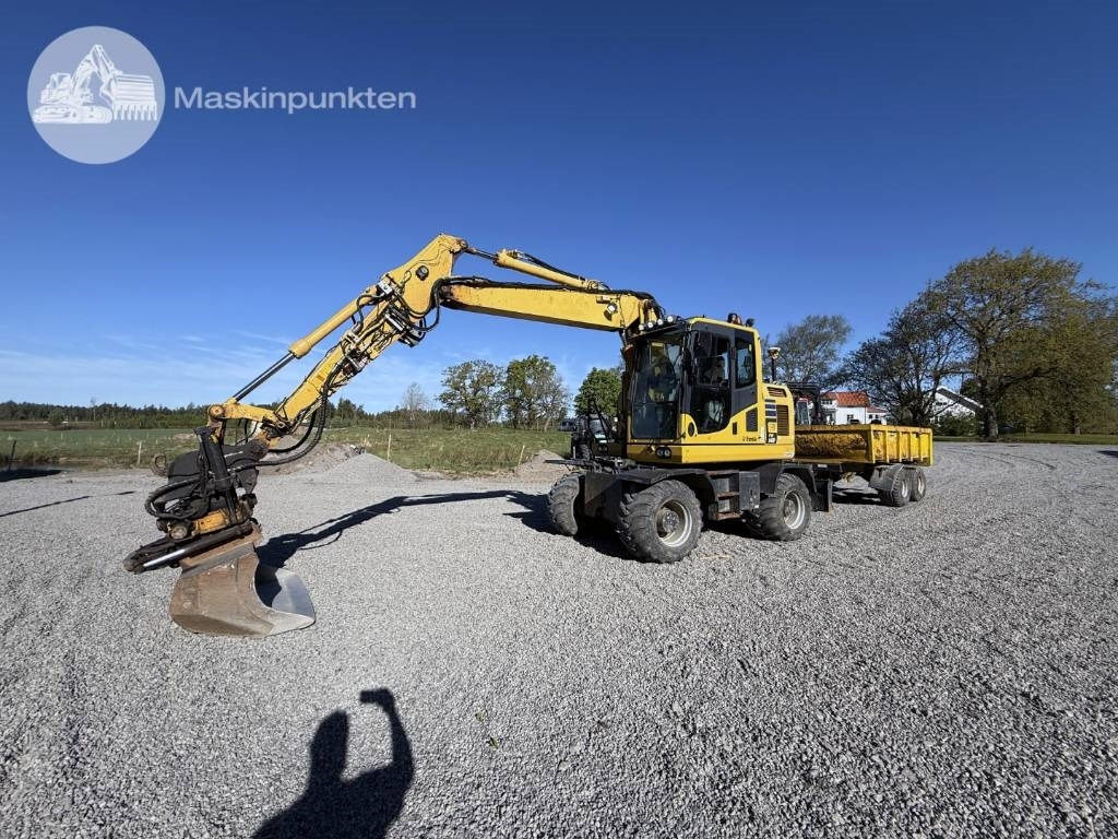 Komatsu PW 148-10 - Ratinis ekskavatorius: foto 1 Komatsu PW 148-10 - Ratinis ekskavatorius: foto 1