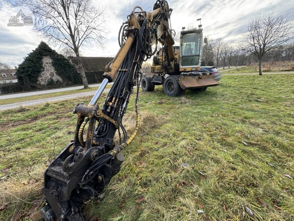 Liebherr A 310 B - Ratinis ekskavatorius: foto 4 Liebherr A 310 B - Ratinis ekskavatorius: foto 4