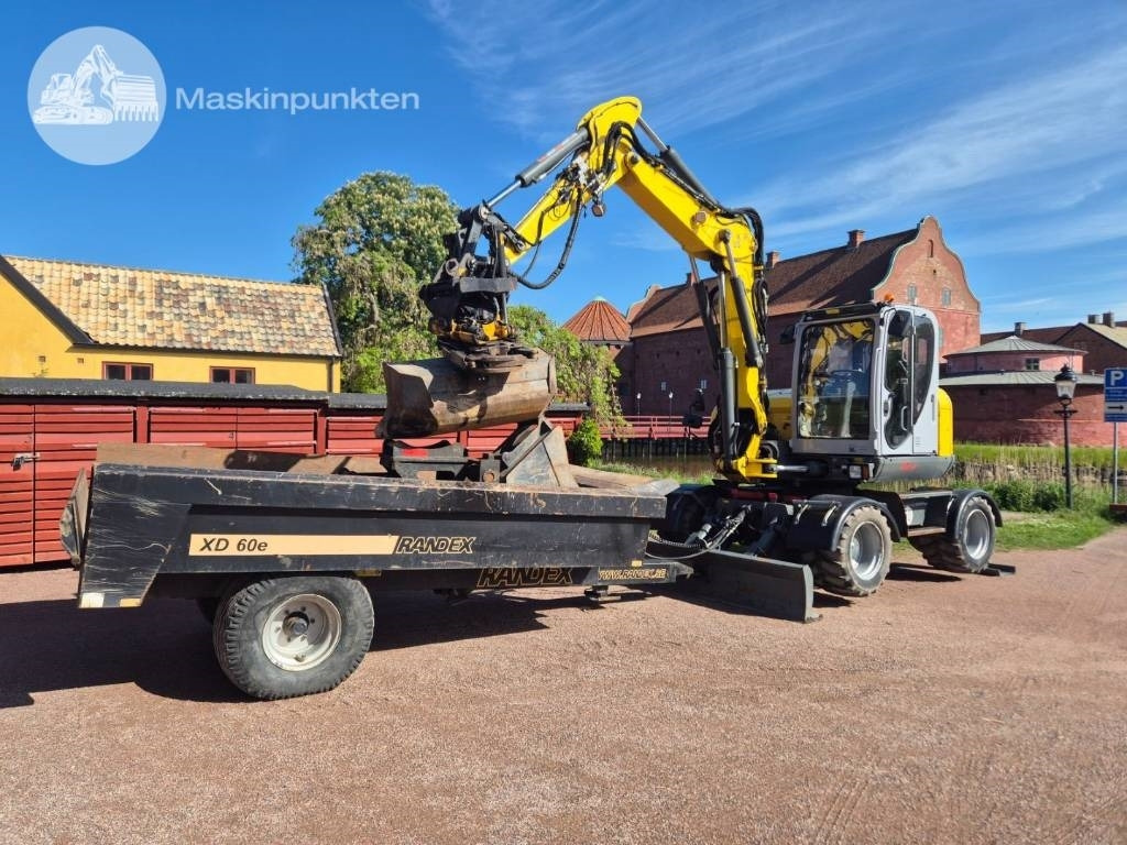 Wacker Neuson EW 100 med vagn - Ratinis ekskavatorius: foto 1 Wacker Neuson EW 100 med vagn - Ratinis ekskavatorius: foto 1