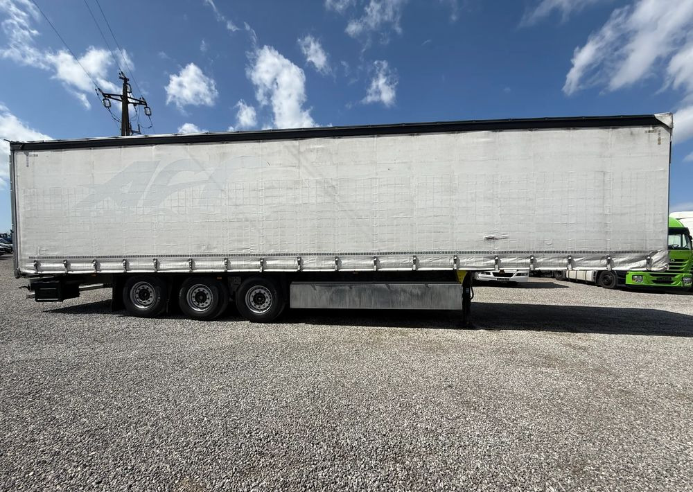 Schmitz Cargobull OSIE SCHMITZ PODNOSZONE OSIE - Tentinė puspriekabė: foto 4 Schmitz Cargobull OSIE SCHMITZ PODNOSZONE OSIE - Tentinė puspriekabė: foto 4