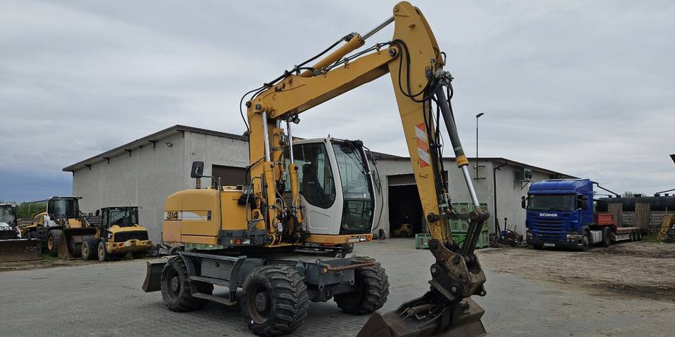 Koparka kołowa Liebherr A314 Litronic 9350 h 4 łyżki kołówka - Ratinis ekskavatorius: foto 4 Koparka kołowa Liebherr A314 Litronic 9350 h 4 łyżki kołówka - Ratinis ekskavatorius: foto 4
