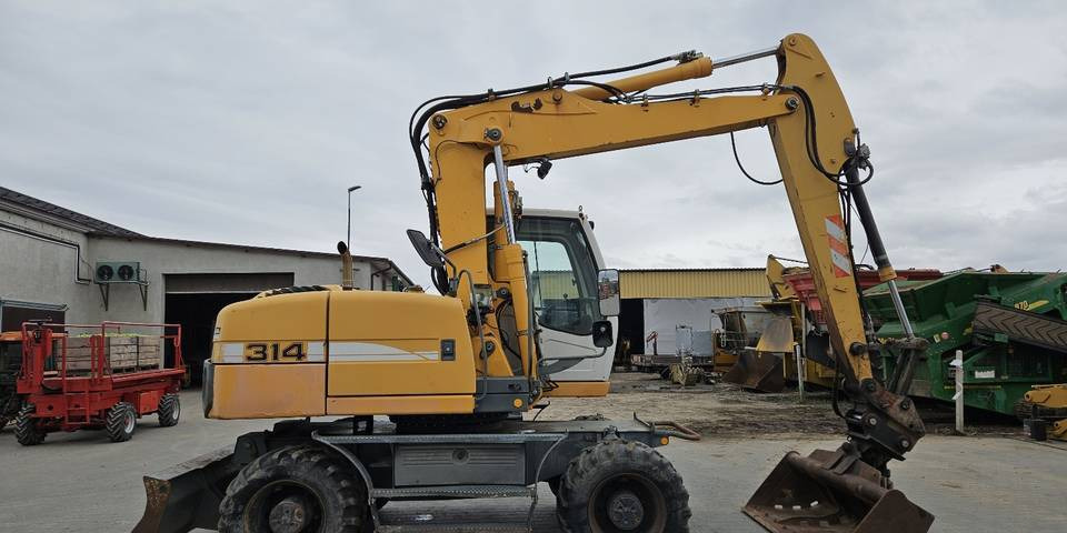 Koparka kołowa Liebherr A314 Litronic 9350 h+ 5 łyżek kołówka - Ratinis ekskavatorius: foto 5 Koparka kołowa Liebherr A314 Litronic 9350 h+ 5 łyżek kołówka - Ratinis ekskavatorius: foto 5