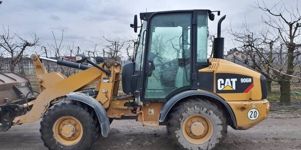Ładowarka Caterpillar 906H widły + łyżka - Ratinis krautuvas: foto 1 Ładowarka Caterpillar 906H widły + łyżka - Ratinis krautuvas: foto 1