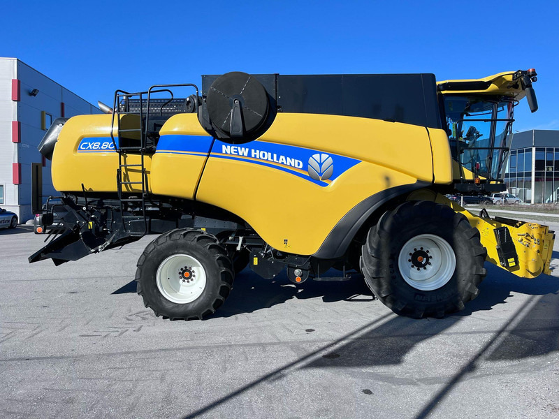 New Holland CX 8.80 - Derliaus nuėmimo kombainas: foto 2 New Holland CX 8.80 - Derliaus nuėmimo kombainas: foto 2