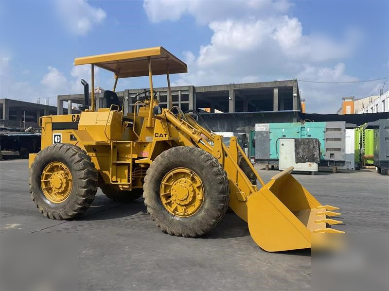 CATERPILLAR 910 - Ratinis krautuvas: foto 1 CATERPILLAR 910 - Ratinis krautuvas: foto 1