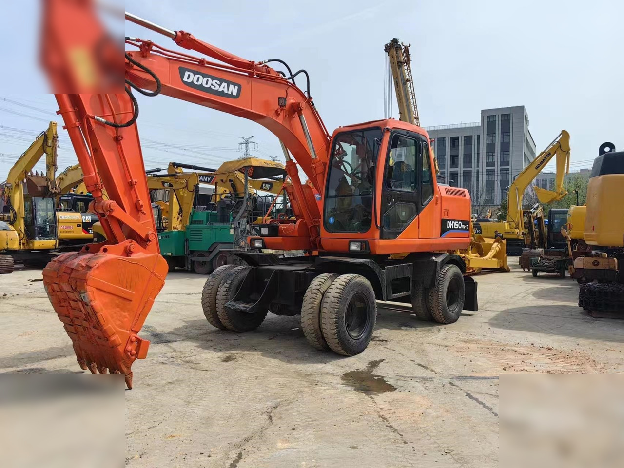 DOOSAN DH150W-7 - Ratinis ekskavatorius: foto 2 DOOSAN DH150W-7 - Ratinis ekskavatorius: foto 2