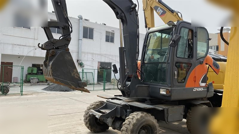 DOOSAN DX60W ECO - Ratinis ekskavatorius: foto 2 DOOSAN DX60W ECO - Ratinis ekskavatorius: foto 2