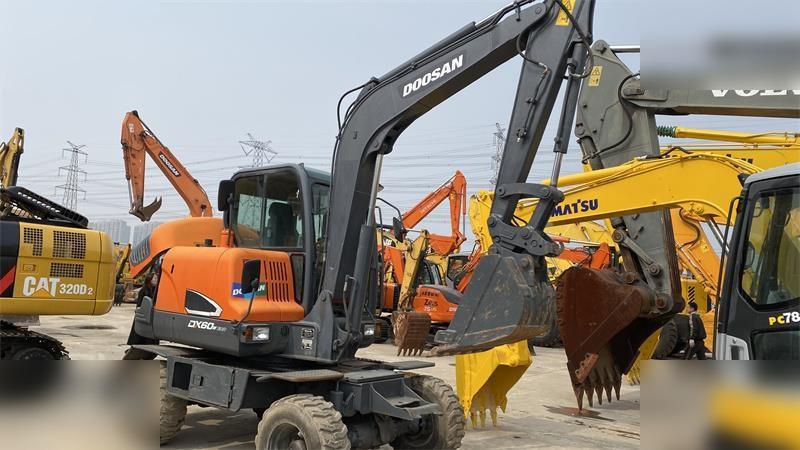 DOOSAN DX60W ECO - Ratinis ekskavatorius: foto 3 DOOSAN DX60W ECO - Ratinis ekskavatorius: foto 3