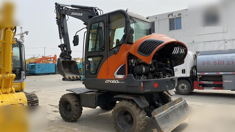 DOOSAN DX60W ECO - Ratinis ekskavatorius: foto 4 DOOSAN DX60W ECO - Ratinis ekskavatorius: foto 4