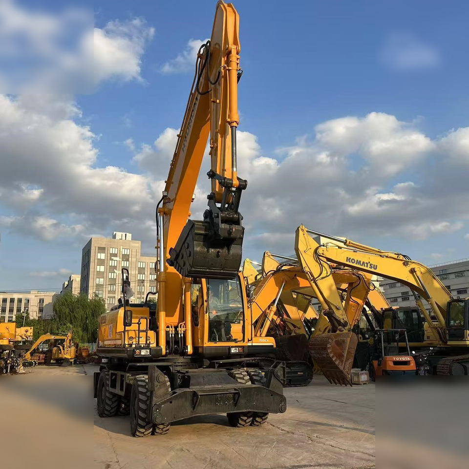 HYUNDAI ROBEX 210W-9 - Ratinis ekskavatorius: foto 4 HYUNDAI ROBEX 210W-9 - Ratinis ekskavatorius: foto 4