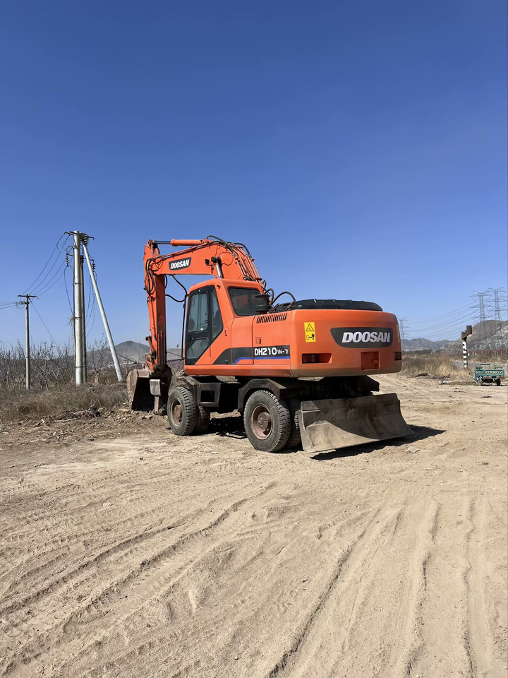 DOOSAN 210w - Ratinis ekskavatorius: foto 5 DOOSAN 210w - Ratinis ekskavatorius: foto 5