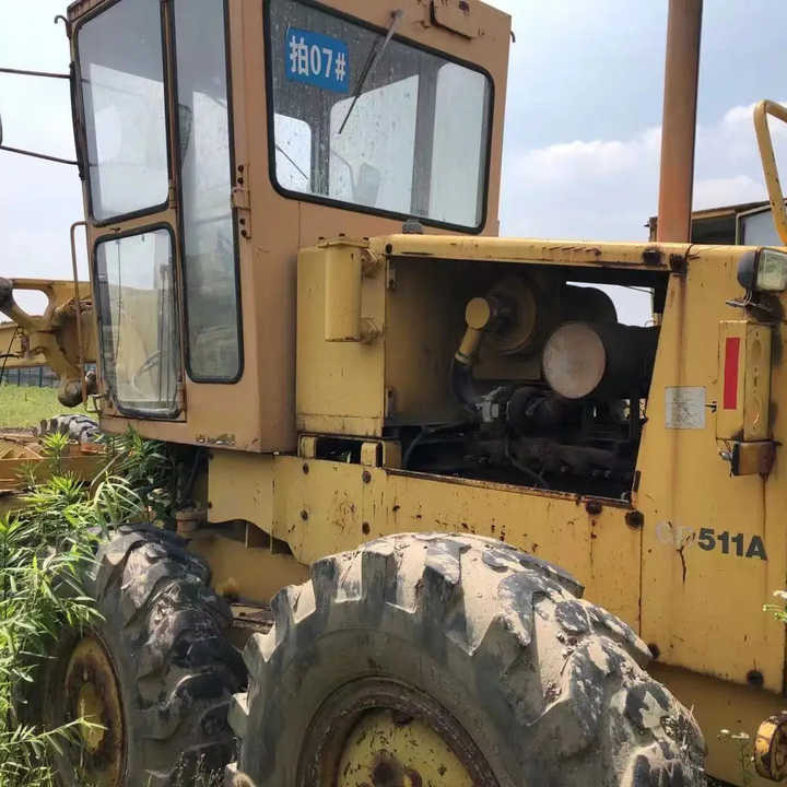 Japan Komatsu GD511 Motor Grader Cheap Price Komatsu Road Grader GD511 Good Condition in China - Greideris: foto 1 Japan Komatsu GD511 Motor Grader Cheap Price Komatsu Road Grader GD511 Good Condition in China - Greideris: foto 1