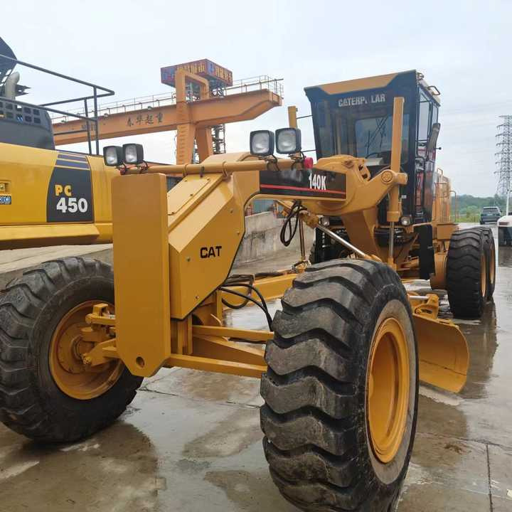 Used Cat 140K New Model Grader Popular Brand Japan Cat Hydraulic Machinery Construction Equipment - Greideris: foto 1 Used Cat 140K New Model Grader Popular Brand Japan Cat Hydraulic Machinery Construction Equipment - Greideris: foto 1