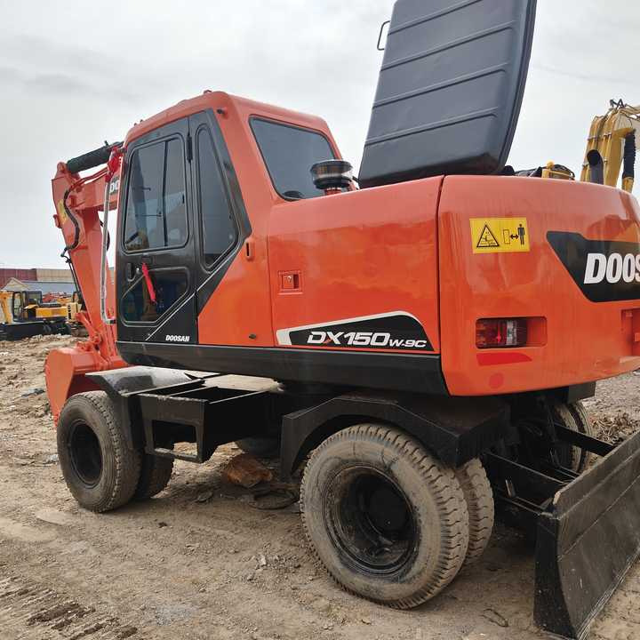 Used Original Doosan Dx150w-9 Wheel Excavator for Sale - Ratinis ekskavatorius: foto 1 Used Original Doosan Dx150w-9 Wheel Excavator for Sale - Ratinis ekskavatorius: foto 1