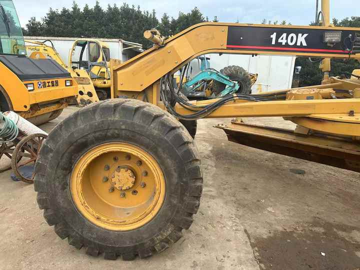Used Caterpillar CAT 140k Land Road Motor Grader CAT140k Used Grader Cheap Price for Sale - Greideris: foto 4 Used Caterpillar CAT 140k Land Road Motor Grader CAT140k Used Grader Cheap Price for Sale - Greideris: foto 4