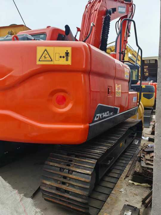 Used Digger DOOSAN DX140 Construction Machinery Construction Digger Used DOOSAN DX140 Cheap Excavator - Vikšrinis ekskavatorius: foto 3 Used Digger DOOSAN DX140 Construction Machinery Construction Digger Used DOOSAN DX140 Cheap Excavator - Vikšrinis ekskavatorius: foto 3