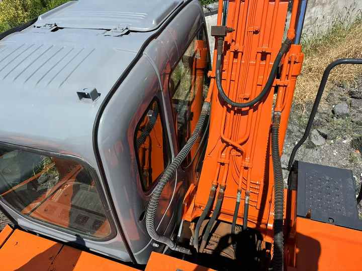 Used Wheel Excavator Hitachi ZX 130W Made in Japan 13ton Hitachi Zx130w Wheel Excavator Price Used Hitachi Zx130 Excavator SALE - Ekskavatorius: foto 5 Used Wheel Excavator Hitachi ZX 130W Made in Japan 13ton Hitachi Zx130w Wheel Excavator Price Used Hitachi Zx130 Excavator SALE - Ekskavatorius: foto 5