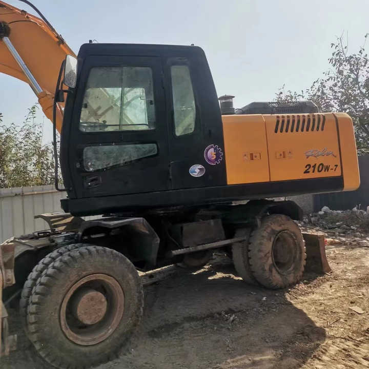 Yellow Color Hyundai210w-7 Used Wheel Excavator Used Hyundai210-7 on Sale with Cheap Price - Vikšrinis ekskavatorius: foto 1 Yellow Color Hyundai210w-7 Used Wheel Excavator Used Hyundai210-7 on Sale with Cheap Price - Vikšrinis ekskavatorius: foto 1
