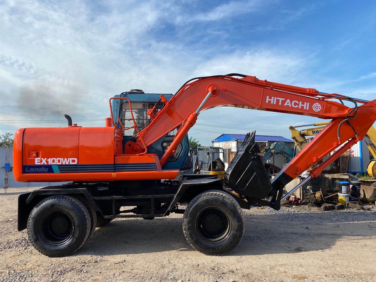 HITACHI EX100WD - Ratinis ekskavatorius: foto 1 HITACHI EX100WD - Ratinis ekskavatorius: foto 1
