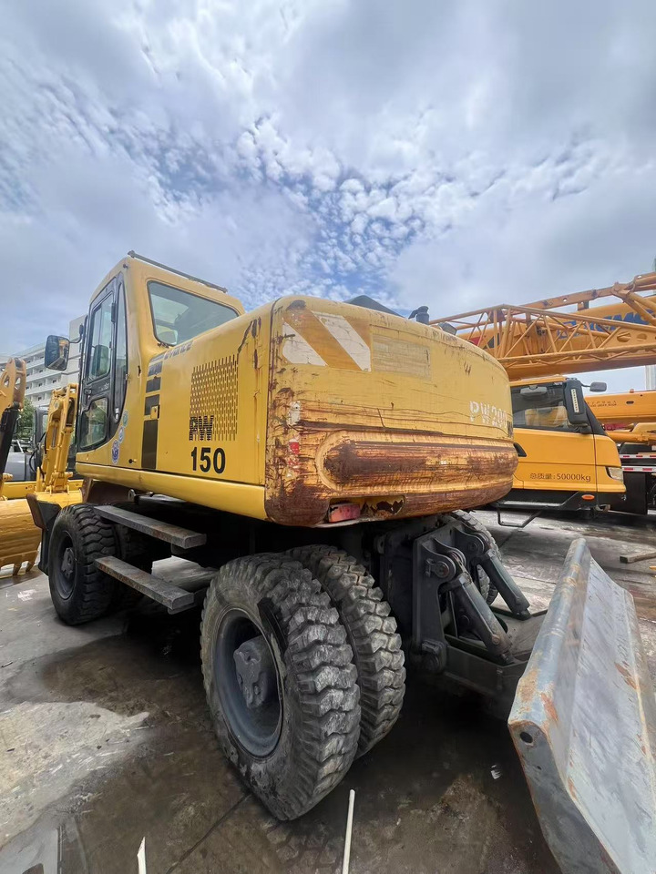 KOMATSU PW150 - Ratinis ekskavatorius: foto 1 KOMATSU PW150 - Ratinis ekskavatorius: foto 1