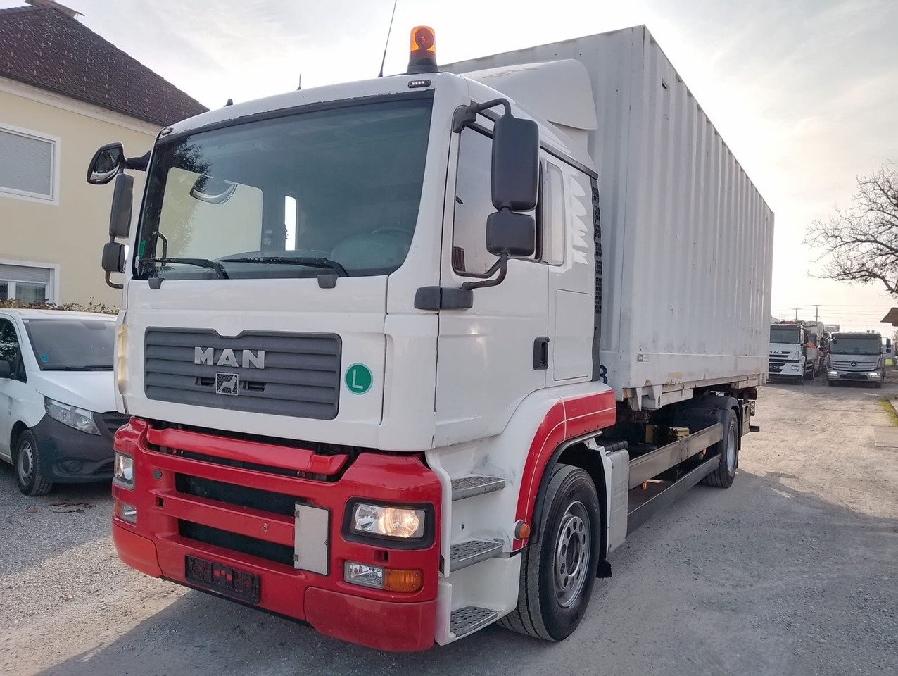 MAN TGA 18 320 - Konteineris-vežimus/ Sukeisti kūną sunkvežimis: foto 1 MAN TGA 18 320 - Konteineris-vežimus/ Sukeisti kūną sunkvežimis: foto 1