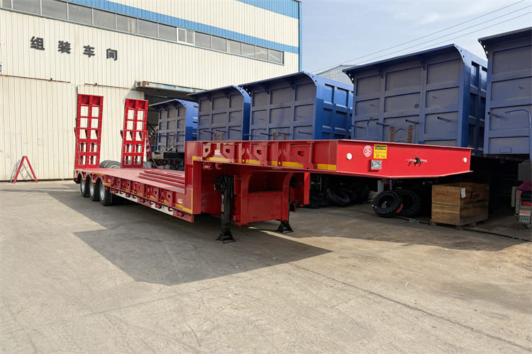 TITAN 100t Lowbed Trailer for Sale in Tanzania - Žemo profilio platforma puspriekabė: foto 1 TITAN 100t Lowbed Trailer for Sale in Tanzania - Žemo profilio platforma puspriekabė: foto 1