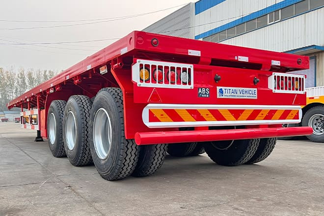 TITAN 3 Axle Flatbed Trailer for Sale in Senegal - Platforminė/ Bortinė puspriekabė: foto 1 TITAN 3 Axle Flatbed Trailer for Sale in Senegal - Platforminė/ Bortinė puspriekabė: foto 1