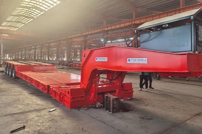 TITAN 4 Axle Extendable Lowboy Trailer for Sale in Nigeria - Žemo profilio platforma puspriekabė: foto 1 TITAN 4 Axle Extendable Lowboy Trailer for Sale in Nigeria - Žemo profilio platforma puspriekabė: foto 1