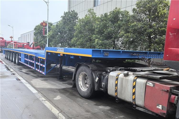 TITAN 6 Axle 54m Telescopic Flatbed Trailer for Sale In Angola - Platforminė/ Bortinė puspriekabė: foto 3 TITAN 6 Axle 54m Telescopic Flatbed Trailer for Sale In Angola - Platforminė/ Bortinė puspriekabė: foto 3