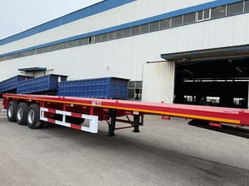 TITAN Flatbed Tri Axle Truck Trailer for Sale in Tanzania - Platforminė/ Bortinė puspriekabė: foto 4 TITAN Flatbed Tri Axle Truck Trailer for Sale in Tanzania - Platforminė/ Bortinė puspriekabė: foto 4