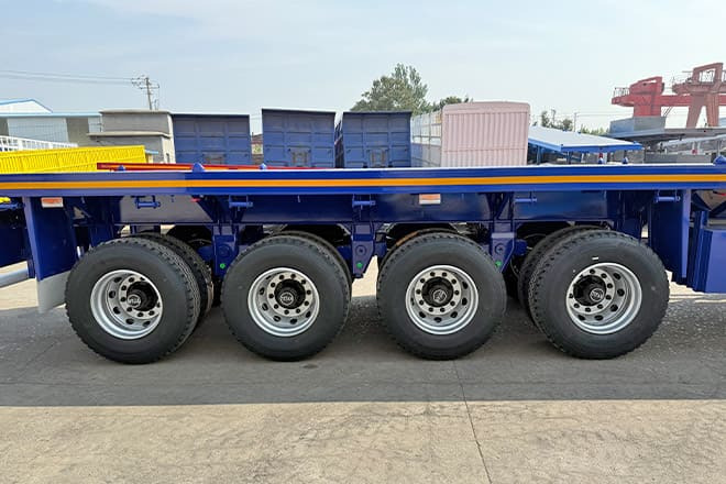TITAN Heavy Duty 4 Axle Flatbed Trailer in Guam - Platforminė/ Bortinė puspriekabė: foto 4 TITAN Heavy Duty 4 Axle Flatbed Trailer in Guam - Platforminė/ Bortinė puspriekabė: foto 4