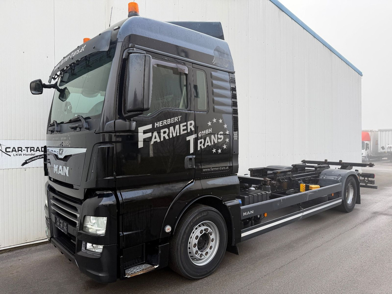 MAN TGX 18.460 Intarder AHK - Konteineris-vežimus/ Sukeisti kūną sunkvežimis: foto 1 MAN TGX 18.460 Intarder AHK - Konteineris-vežimus/ Sukeisti kūną sunkvežimis: foto 1