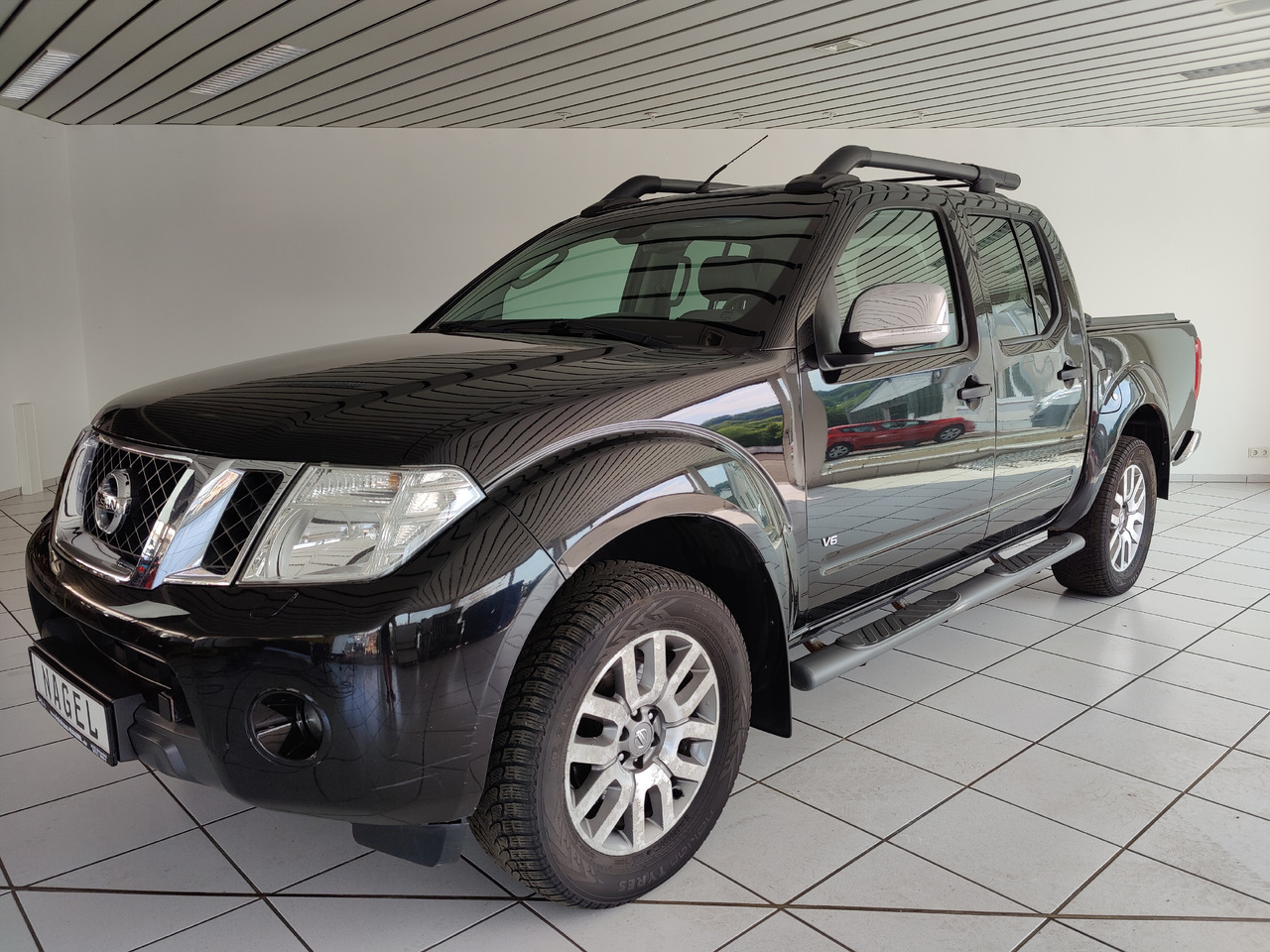 Nissan Navara Pickup (D40M)(05.2005->) Double Cab LE V6 4X4 Navi Kam Leder SHZ AHK - Pikapas: foto 1 Nissan Navara Pickup (D40M)(05.2005->) Double Cab LE V6 4X4 Navi Kam Leder SHZ AHK - Pikapas: foto 1