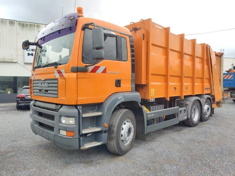 MAN TGA 26.320 6x2 garbage truck ZOELLER - Šiukšliavežis: foto 1 MAN TGA 26.320 6x2 garbage truck ZOELLER - Šiukšliavežis: foto 1
