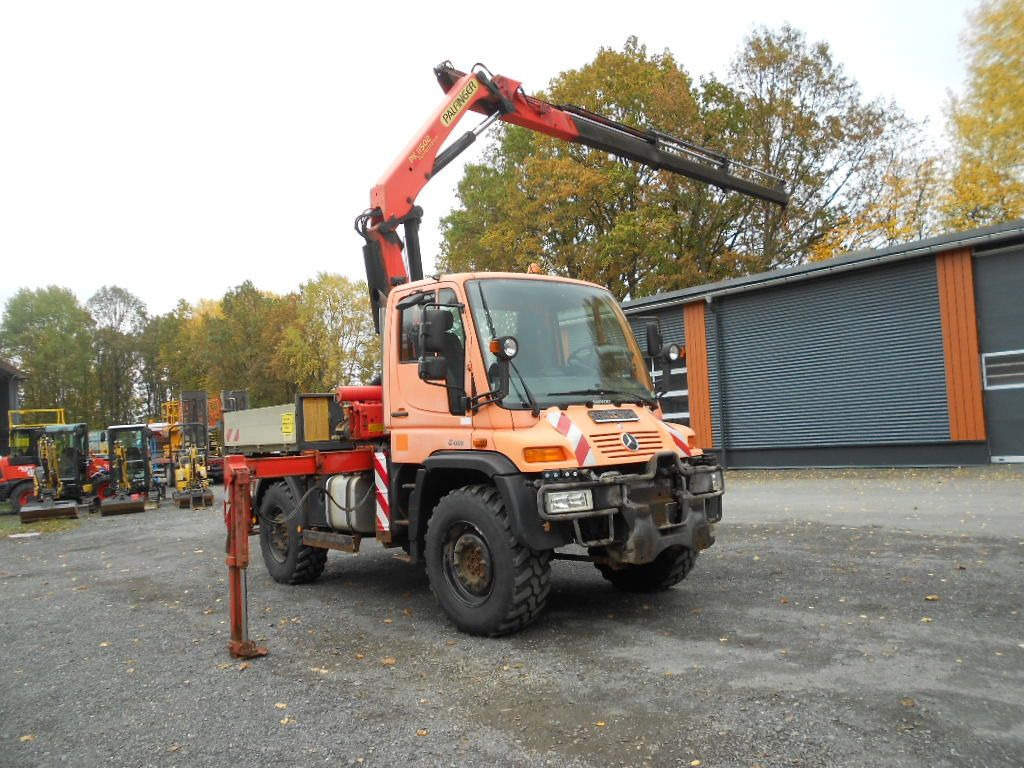 Mercedes-Benz Unimog U400 mit Kran Palfinger PK11502 - Sunkvežimis, Sunkvežimis su kranu: foto 1 Mercedes-Benz Unimog U400 mit Kran Palfinger PK11502 - Sunkvežimis, Sunkvežimis su kranu: foto 1