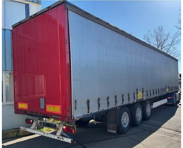 Krone SPD27 3-AXLE CURTAINSIDE WITH SLIDING ROOF (DRUM BRAKES / SAF-AXLES / ABS-BRAKE SYSTEM / XL-CERTIFICATE) - Tentinė puspriekabė: foto 2 Krone SPD27 3-AXLE CURTAINSIDE WITH SLIDING ROOF (DRUM BRAKES / SAF-AXLES / ABS-BRAKE SYSTEM / XL-CERTIFICATE) - Tentinė puspriekabė: foto 2