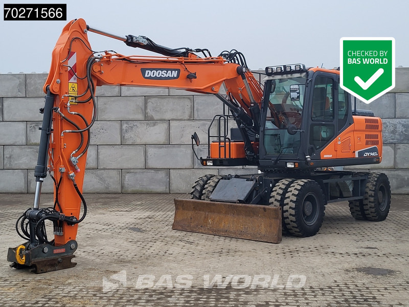 Doosan DX140 W-5 OIL QUICK - GERMAN - Ratinis ekskavatorius: foto 1 Doosan DX140 W-5 OIL QUICK - GERMAN - Ratinis ekskavatorius: foto 1