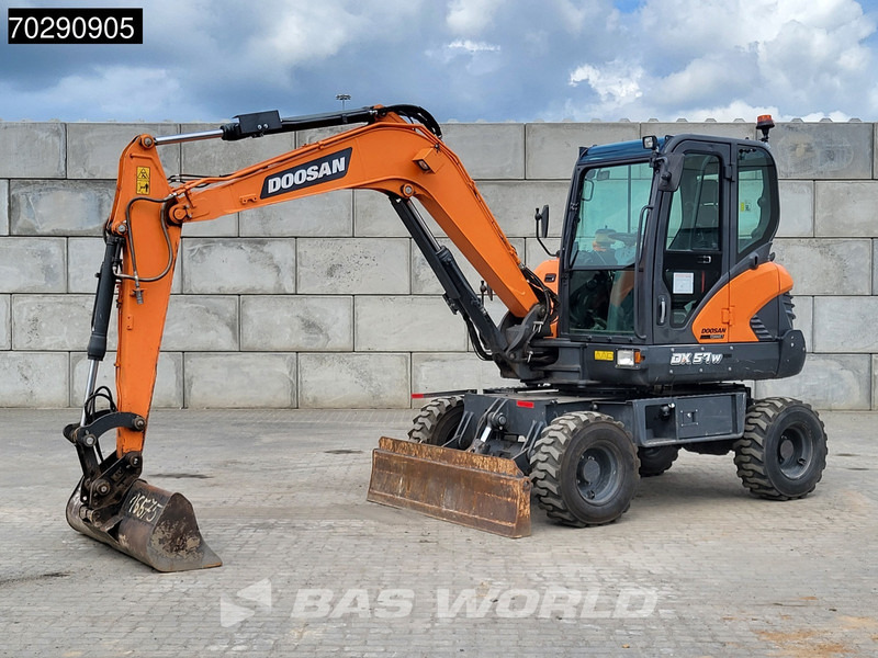Doosan DX57W-7 - Ratinis ekskavatorius: foto 2 Doosan DX57W-7 - Ratinis ekskavatorius: foto 2