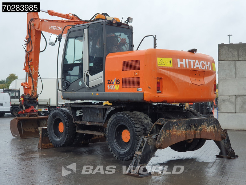 Hitachi ZX140W -3 OUTRIGGERS - ROTOTILT - Ratinis ekskavatorius: foto 2 Hitachi ZX140W -3 OUTRIGGERS - ROTOTILT - Ratinis ekskavatorius: foto 2