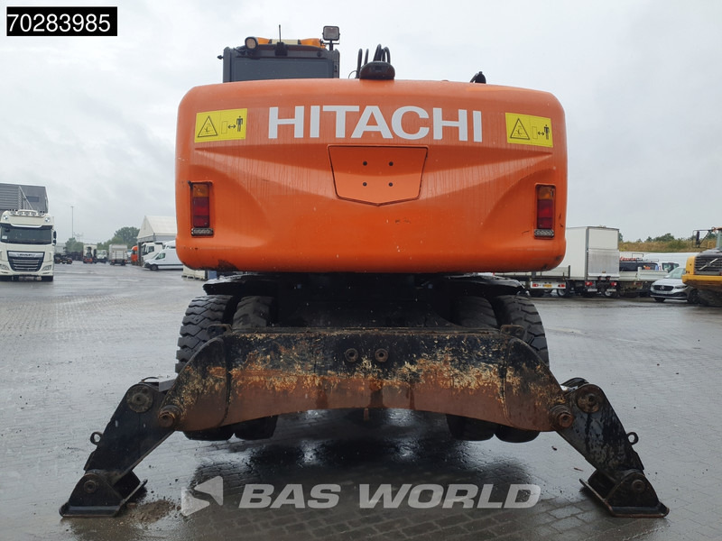 Hitachi ZX140W -3 OUTRIGGERS - ROTOTILT - Ratinis ekskavatorius: foto 3 Hitachi ZX140W -3 OUTRIGGERS - ROTOTILT - Ratinis ekskavatorius: foto 3