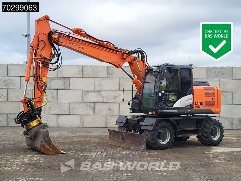 Hitachi ZX140W -5B Engcon Tiltrotator - Ratinis ekskavatorius: foto 1 Hitachi ZX140W -5B Engcon Tiltrotator - Ratinis ekskavatorius: foto 1