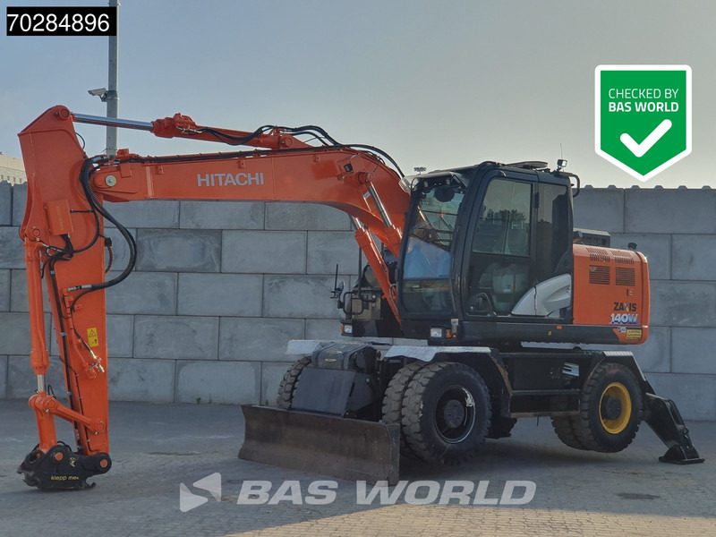 Hitachi ZX140W -6 OUTRIGGERS + BLADE - Ratinis ekskavatorius: foto 1 Hitachi ZX140W -6 OUTRIGGERS + BLADE - Ratinis ekskavatorius: foto 1