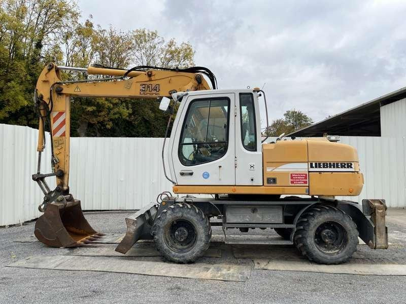 Liebherr A314 Litronic - Ratinis ekskavatorius: foto 3 Liebherr A314 Litronic - Ratinis ekskavatorius: foto 3