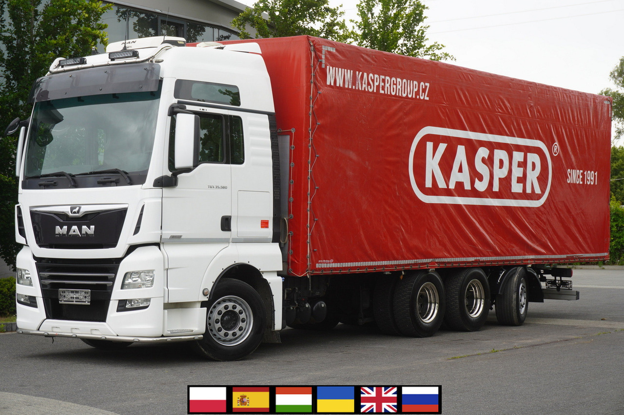 MAN MAN TGX 35.580 E6 8x4 /4 / 23 EPAL tarp superstructure / 4th axle steered - Tentinis sunkvežimis: foto 1 MAN MAN TGX 35.580 E6 8x4 /4 / 23 EPAL tarp superstructure / 4th axle steered - Tentinis sunkvežimis: foto 1