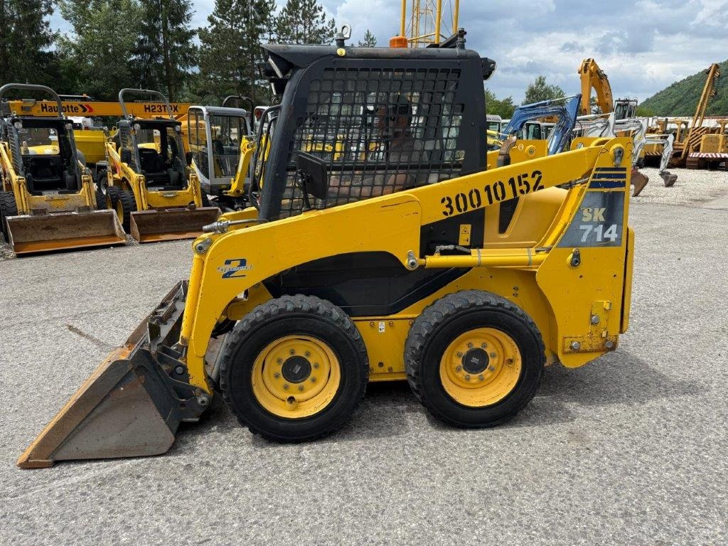 Komatsu SK714-5 (4026) - Mini krautuvas: foto 1 Komatsu SK714-5 (4026) - Mini krautuvas: foto 1
